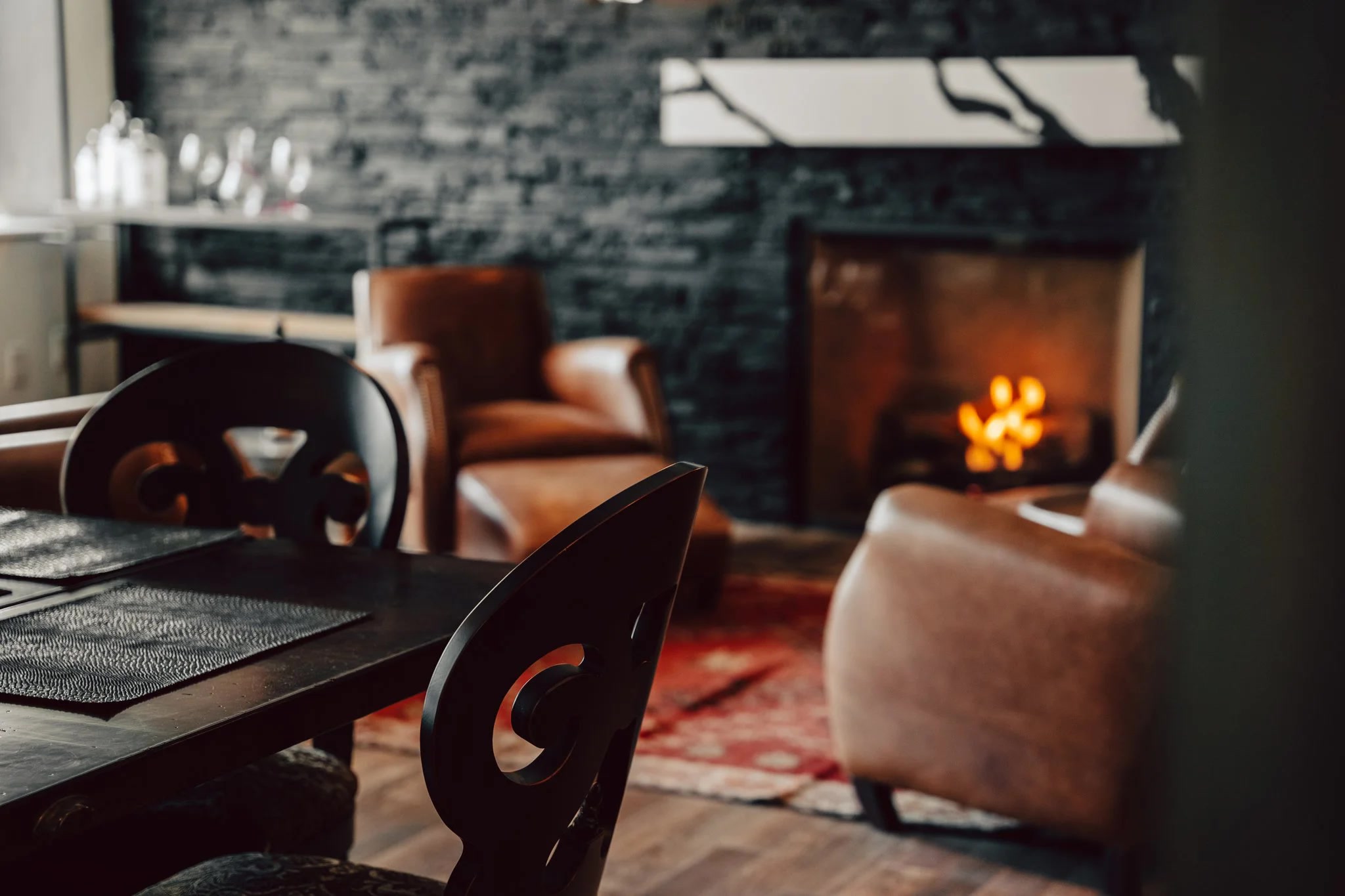 Living room with fireplace and dining table